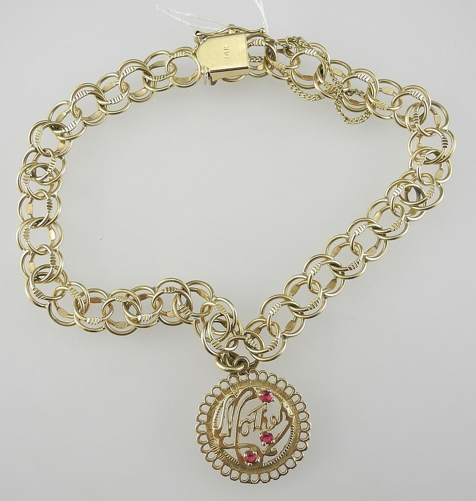 14K (marked) Gold Charm Bracelet with 10K Charm, 8"L, 14.1g.: 14K (marked) Gold Charm Bracelet with 10K Charm, 8"L, 14.1g.