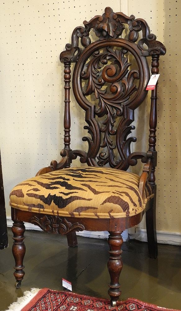 Carved Walnut High Back Chair with Tiger Upholstery.: Carved Walnut High Back Chair with Tiger Upholstery.