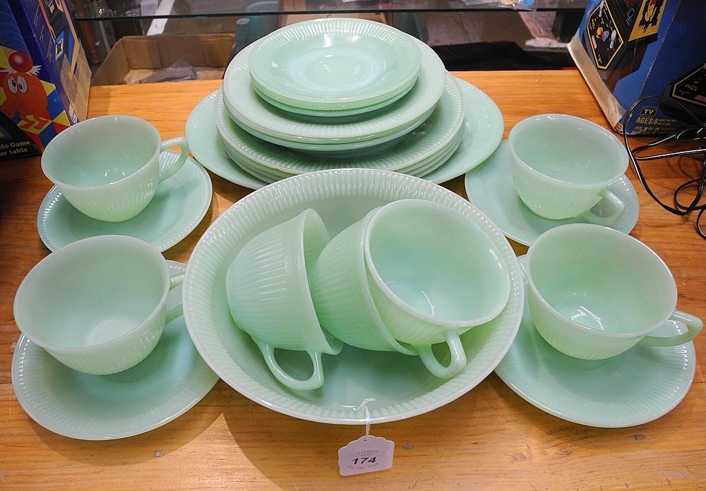 Collection of Jadeite Glass Bowls / Plates / Teacups & Saucers, Largest 12"W.: Collection of Jadeite Glass Bowls / Plates / Teacups & Saucers, Largest 12"W.