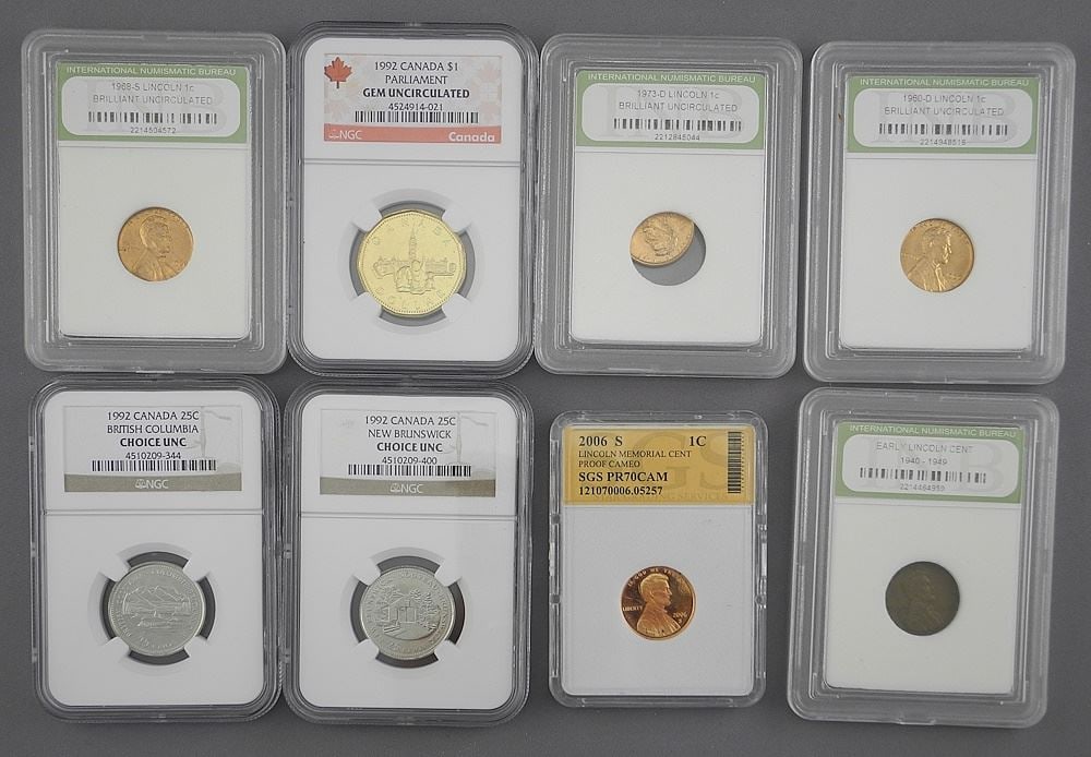 Collection of Graded Coins: 5 Lincoln Cents / 2 Cdn 25 Cent / 1992 Cdn $1. (1 of 2)