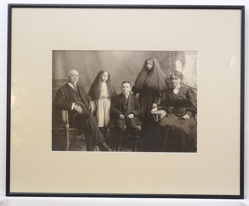 Photograph of a 19th C. Family, 9" x 13". (1 of 2)