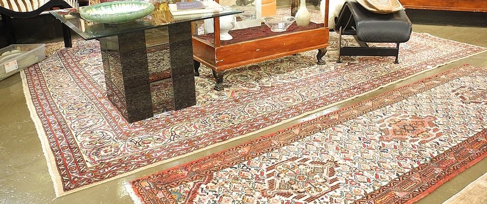 Handknotted Mashad Carpet Approximately 12'10" x 9'7" (low pile noted).: Handknotted Mashad Carpet Approximately 12'10" x 9'7" (low pile noted).