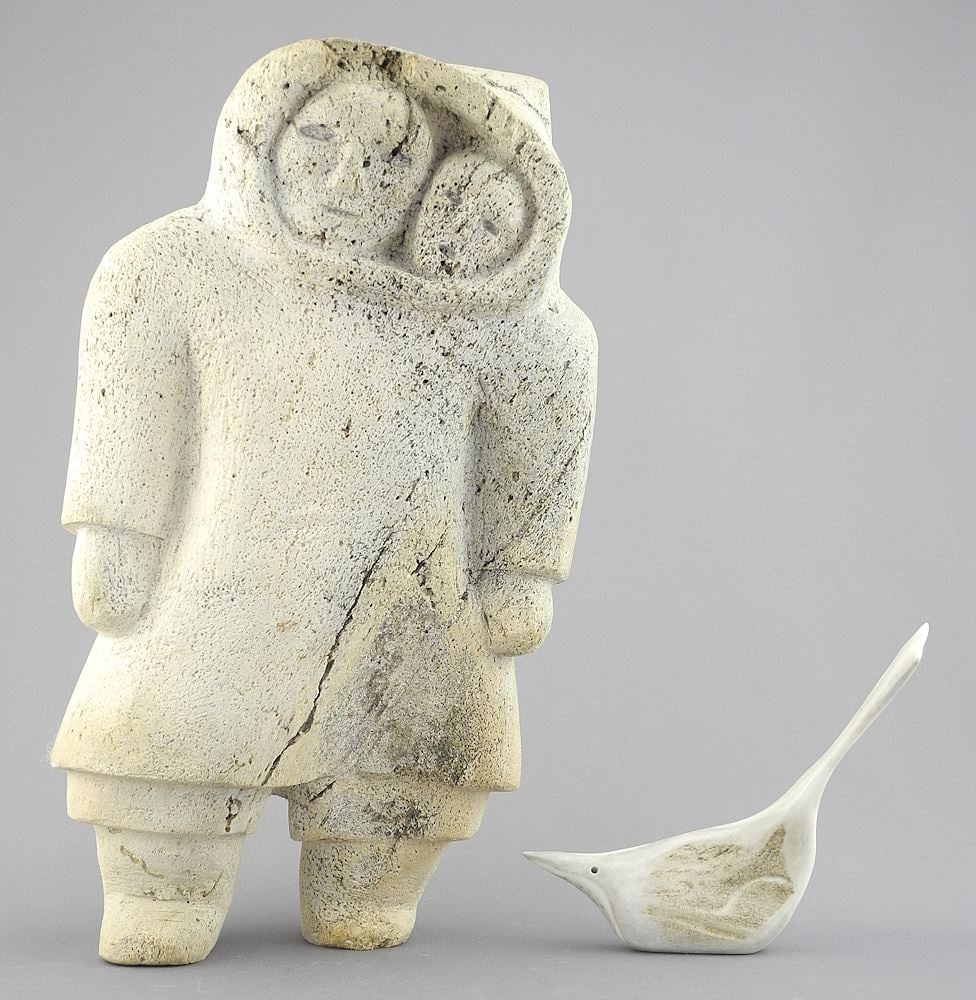 Inuit Whalebone Figure signed with Syllabics'93, 12 1/4"h, "Mother in Amauh with Antler Bird. (1 of 4)