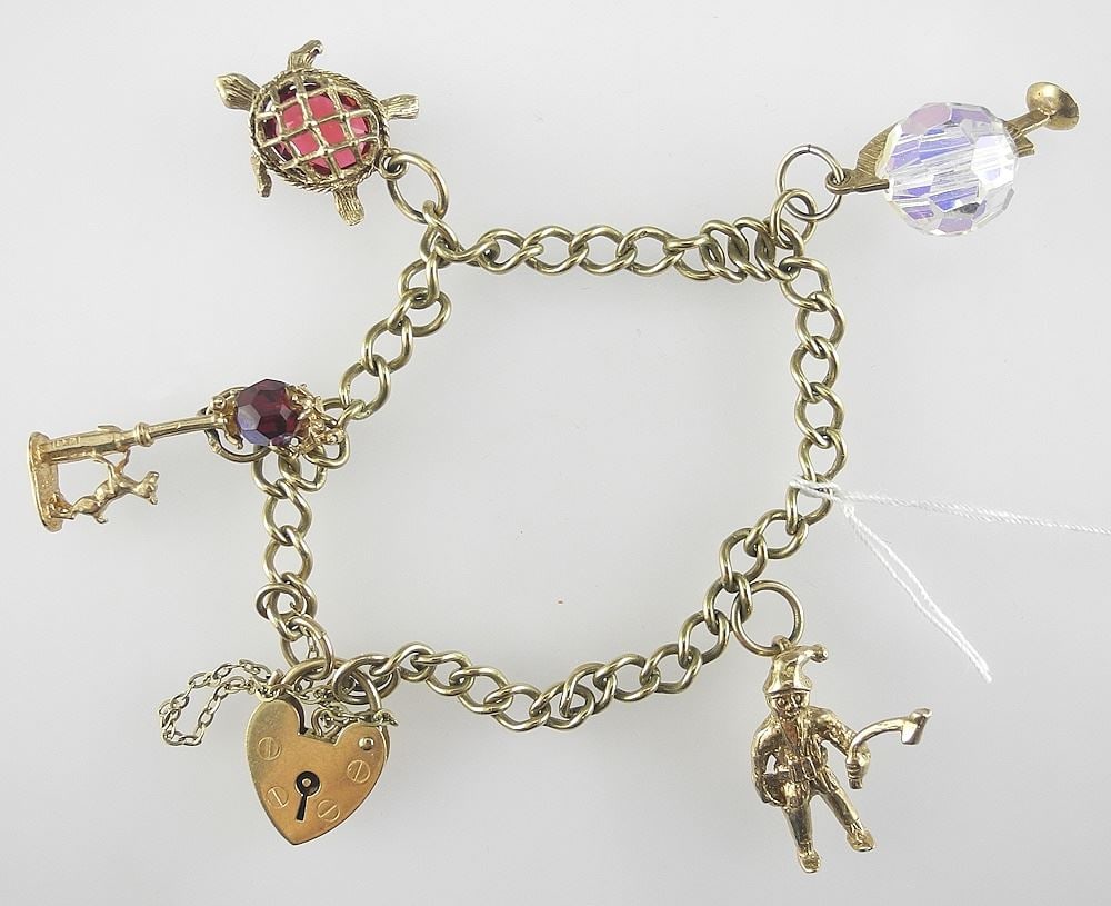 Gold Coloured Chain with Various Gold Charms, 17.96g.: Gold Coloured Chain with Various Gold Charms, 17.96g.