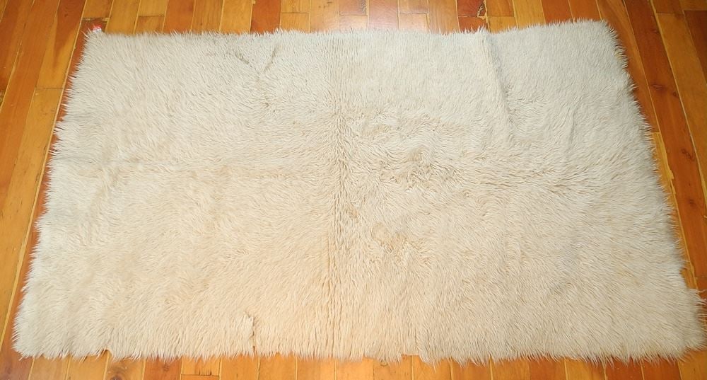 Flokati Carpet Approximately 8' x 4' 6" (edge tear & condition noted). (1 of 6)