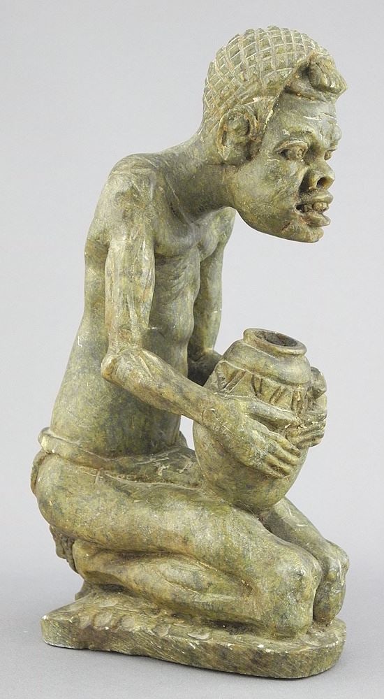 African Stone Carving "Figure with Pot", 8"h. (1 of 3)