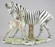 Italian Porcelain Zebra Sculpture, signed, 8 1/8 x 11 1/2 x 5".