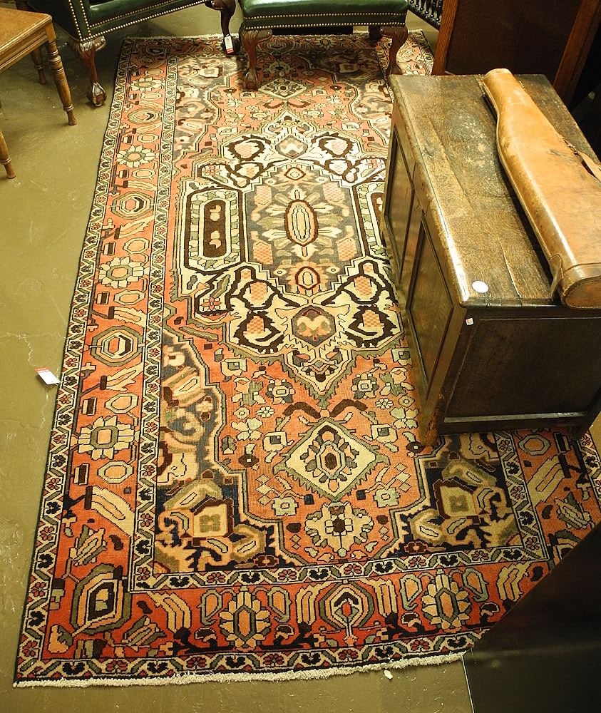 Hand Knotted Bakhtyar Carpet Approximately 4'8" x 9'4". (1 of 2)