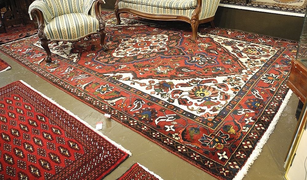 Hand Knotted Mashhad Carpet Approximately 6'11" x 10'3". (1 of 3)
