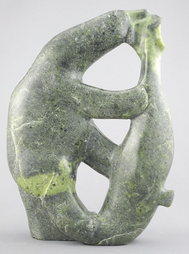 11"h Unsigned Inuit Greenstone Sculpture, "Bear Feeding on Prey".: 11"h Unsigned Inuit Greenstone Sculpture, "Bear Feeding on Prey".