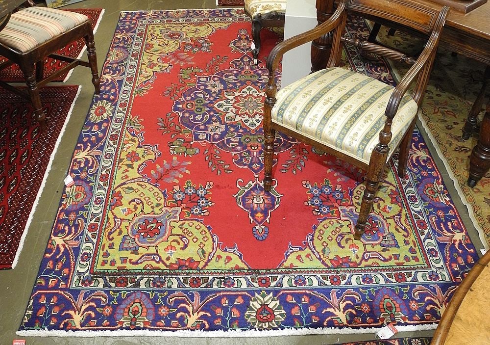 Hand Knotted Tabriz Carpet Approximately 5'9" x 9'2". (1 of 3)