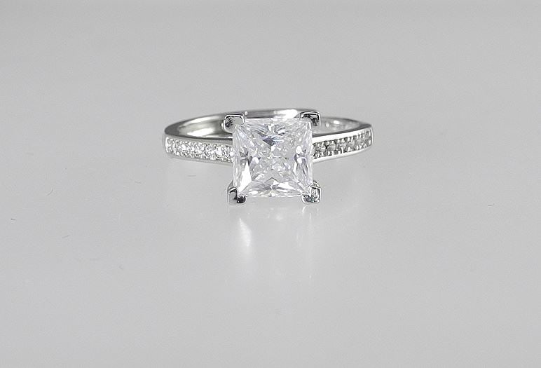 2ct Moissanite Ring Mounted in Sterling with White Gold Overlay, with Report & Box.: 2ct Moissanite Ring Mounted in Sterling with White Gold Overlay, with Report & Box.