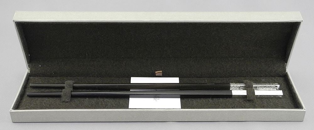 Pair of Christofle Ebony & Silver Plate Chop Sticks in Original Box.: Pair of Christofle Ebony & Silver Plate Chop Sticks in Original Box.