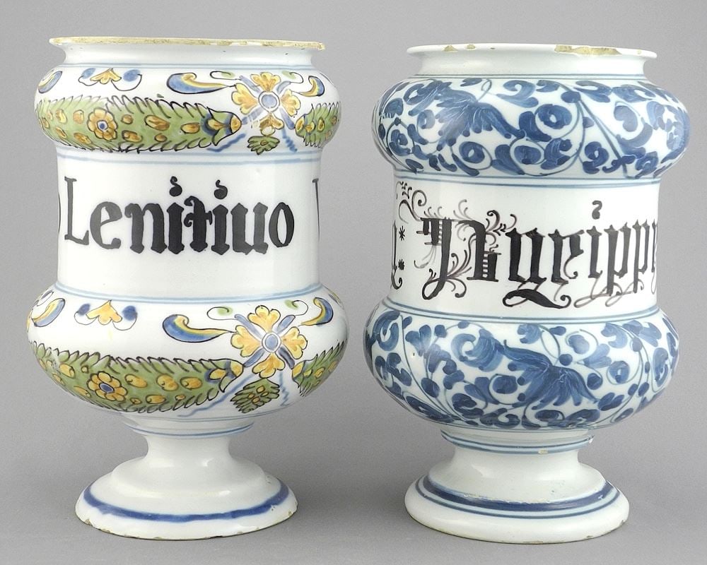 Two Antique Albarellos, 7 3/8"h (chipped variously).: Two Antique Albarellos, 7 3/8"h (chipped variously).