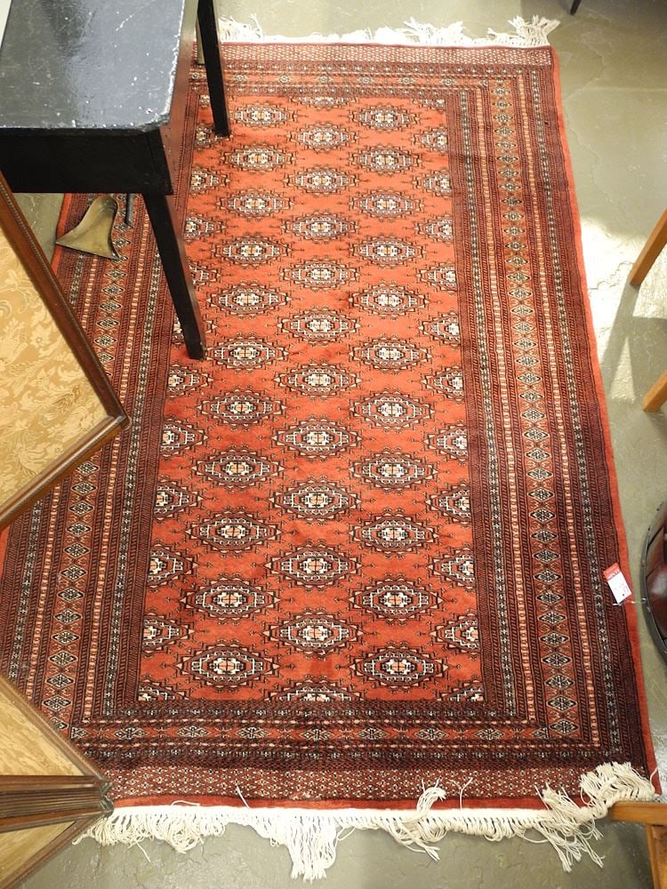 Hand Knotted Bokhara Carpet Approximately 4'3" x 6'11". (1 of 2)