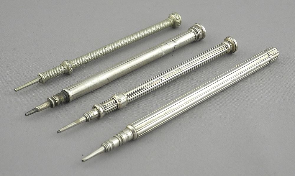 Collection of Four Silver Plated Propelling Pencils Including Mordan & Co., 5". (1 of 3)