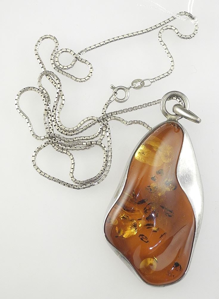 Baltic Amber Asymmetrical Pendant with Sterling Chain.: Baltic Amber Asymmetrical Pendant with Sterling Chain.
