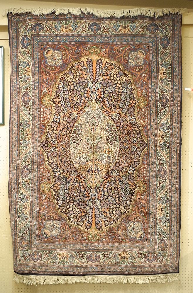 Kirman Rug Approximately 4'9" x 7'7". (1 of 4)