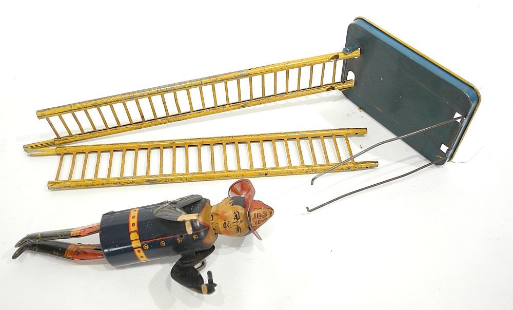 Louis Marx & Co. NY USA Fireman Wind-up Toy.: Louis Marx & Co. NY USA Fireman Wind-up Toy.