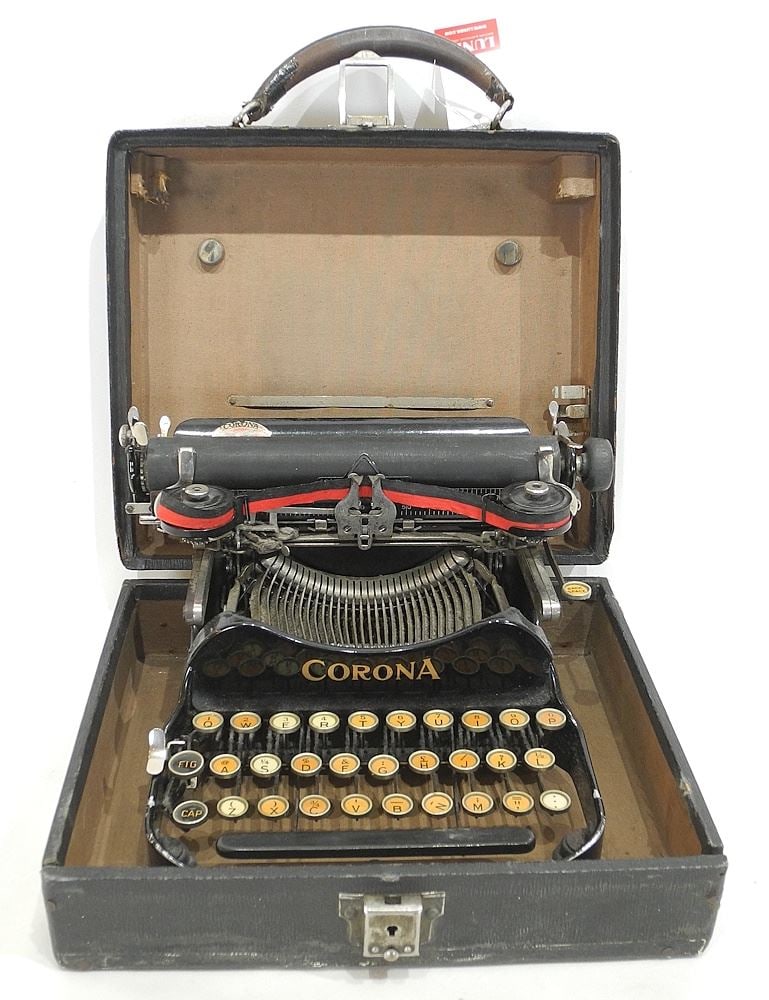 Corona Folding Typewriter with Original Case, 4 3/8 x 11 1/4 x 9 3/4". (1 of 2)