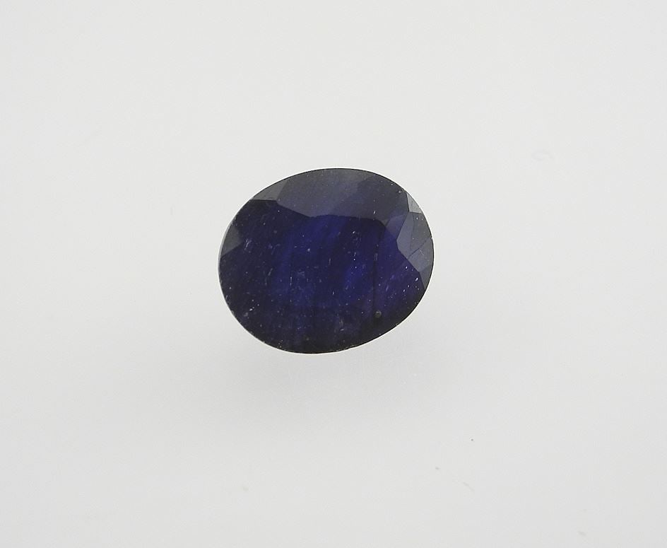 6.65ct Oval Cut Blue Sapphire Gemstone ($7,980 Appraisal).: 6.65ct Oval Cut Blue Sapphire Gemstone ($7,980 Appraisal).