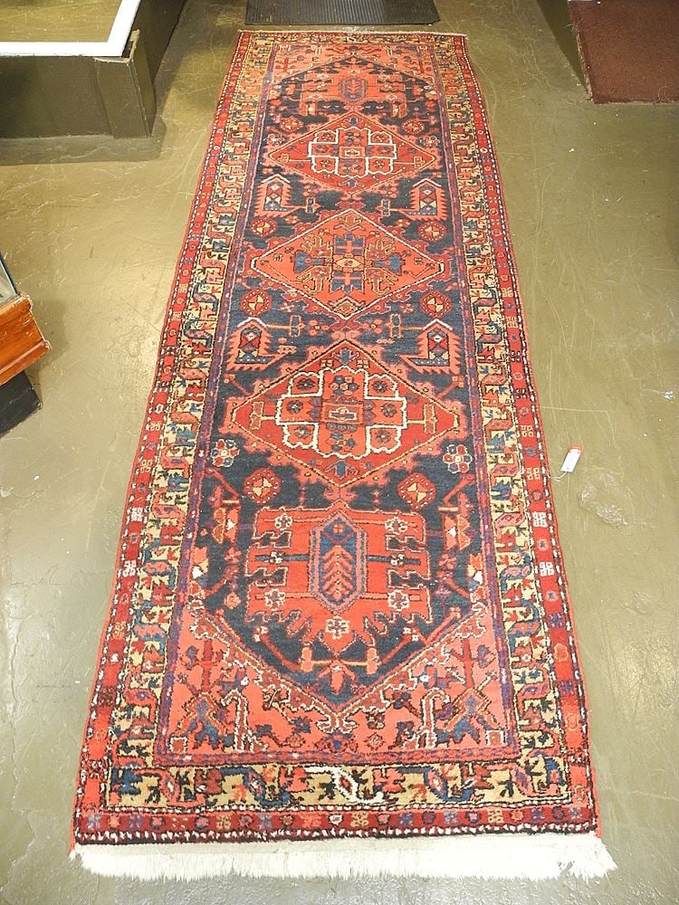 Hand Knotted Persian Runners Approximately 11'3" x 3'4". (1 of 2)