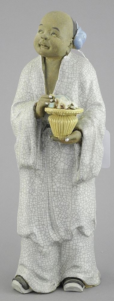 Shiwan Ware Figure of a Flower Carrier, 10 1/8"h. (1 of 3)