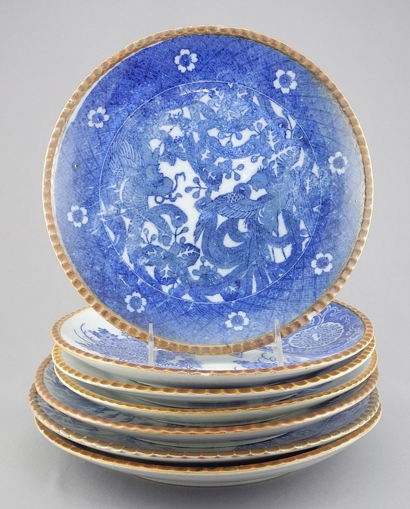 Seven Japanese Blue & White Imari Porcelain Brown Edge Dishes, 9 7/8 - 11" Diameter (one chipped): Seven Japanese Blue & White Imari Porcelain Brown Edge Dishes, 9 7/8 - 11" Diameter (one chipped)