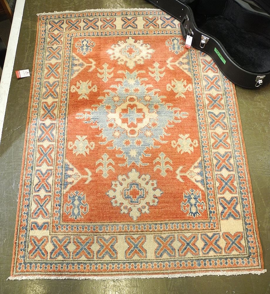 Hand Knotted Persian Carpet Approximately 3'8" x 5'. (1 of 2)