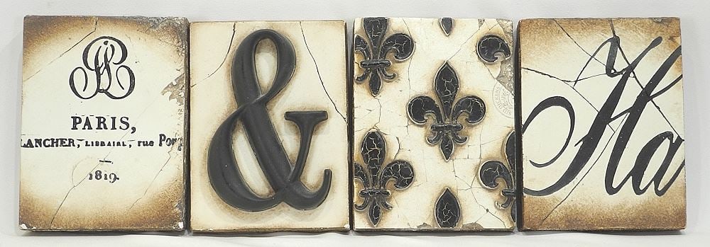 Four Sid Dickens Memory Blocks Approximately 8 x 6" (small chips noted). (1 of 2)