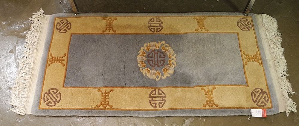Chinese Wool Mat Approximately 2'1" x 5'9" (spot noted). (1 of 2)