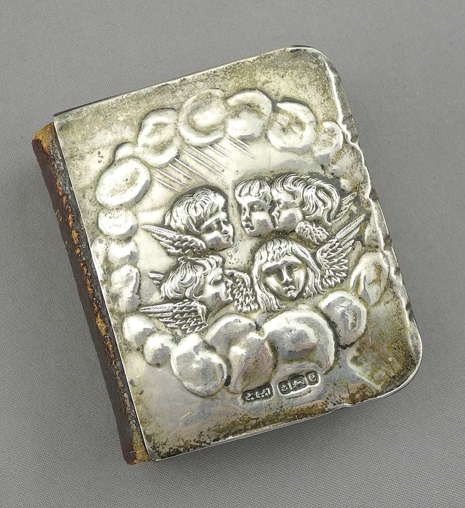 Hallmarked Silver "Cherub Choir" Book of Common Prayer, 2 1/8"h, 31g.: Hallmarked Silver "Cherub Choir" Book of Common Prayer, 2 1/8"h, 31g.