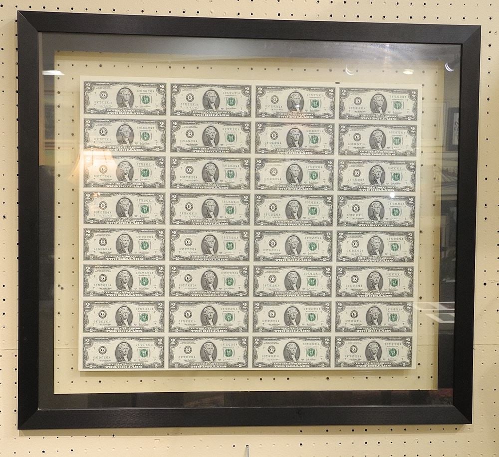 Uncut Sheet of Thirty Two United States $2 Bills, Series 2003A, 21 1/8 x 23 3/4". (1 of 2)