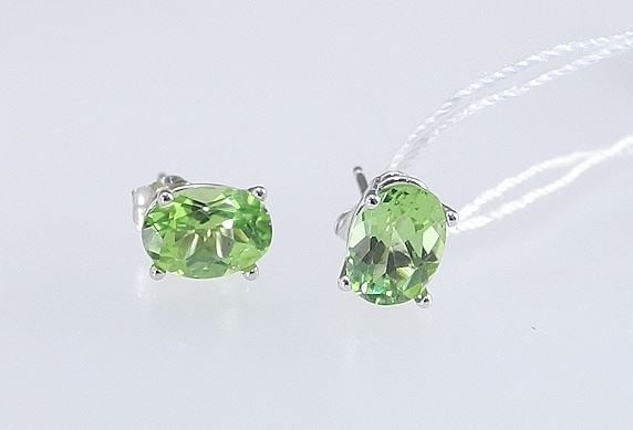 Pair of 10K (marked) Gold & Peridot Stud Earrings, 0.9g.: Pair of 10K (marked) Gold & Peridot Stud Earrings, 0.9g.