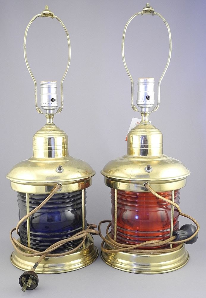 Pair of Brass Marine signed Style Lamps (splitting noted).: Pair of Brass Marine signed Style Lamps (splitting noted).