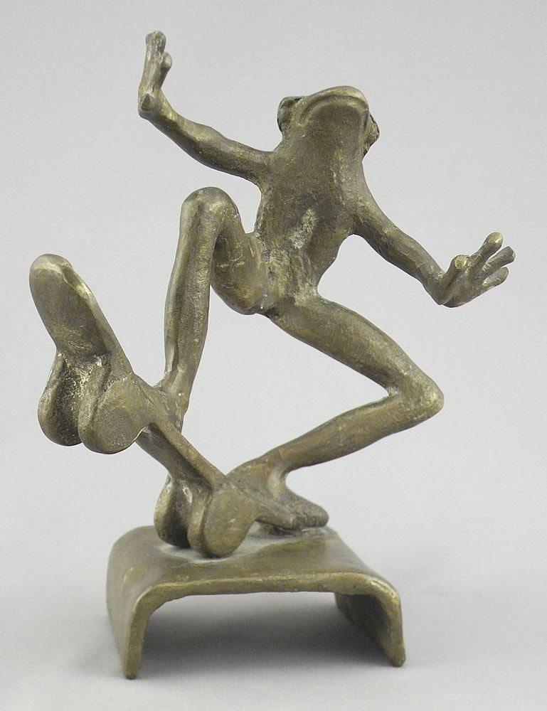 Unsigned Cast Bronze "Skateboarding Frog" Sculpture, 7 1/4"h, 1235g.: Unsigned Cast Bronze "Skateboarding Frog" Sculpture, 7 1/4"h, 1235g.