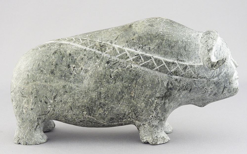 Inuit Stone Sculpture signed Pangon (Peggy Ekagina), 7 3/4"L, "Musk-Ox Spirit" with Tag. (1 of 6)