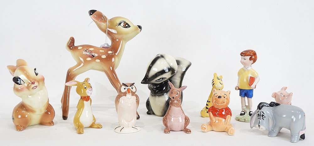 Collection of Walt Disney Figurines: 3 American Pottery Co./7 Beswick.: Collection of Walt Disney Figurines: 3 American Pottery Co./7 Beswick.