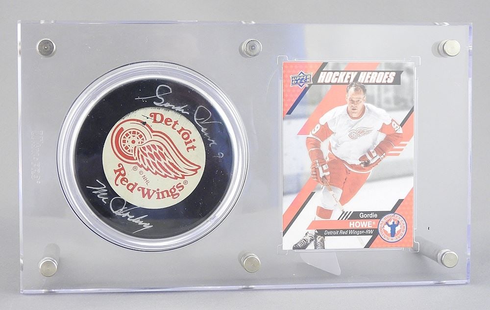 Gordie Howe Autograph Puck, 5 x 8 1/2".: Gordie Howe Autograph Puck, 5 x 8 1/2".