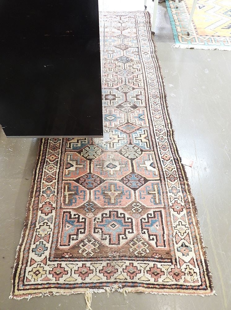 Hand Knotted Persian Runner Approximately 9'6" x 3'. (1 of 4)