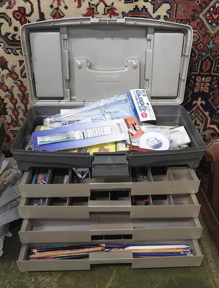 Extendable Box Containing Modeling Sundries.