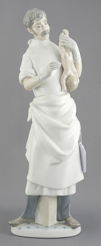 Lladro Porcelain "Obstetrician With Newborn Baby" Sculpture, 14"h.: Lladro Porcelain "Obstetrician With Newborn Baby" Sculpture, 14"h.