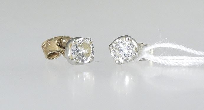Pair of 18-14K Gold Diamond Stud Earrings, 1.06 Grams. (1 of 2)
