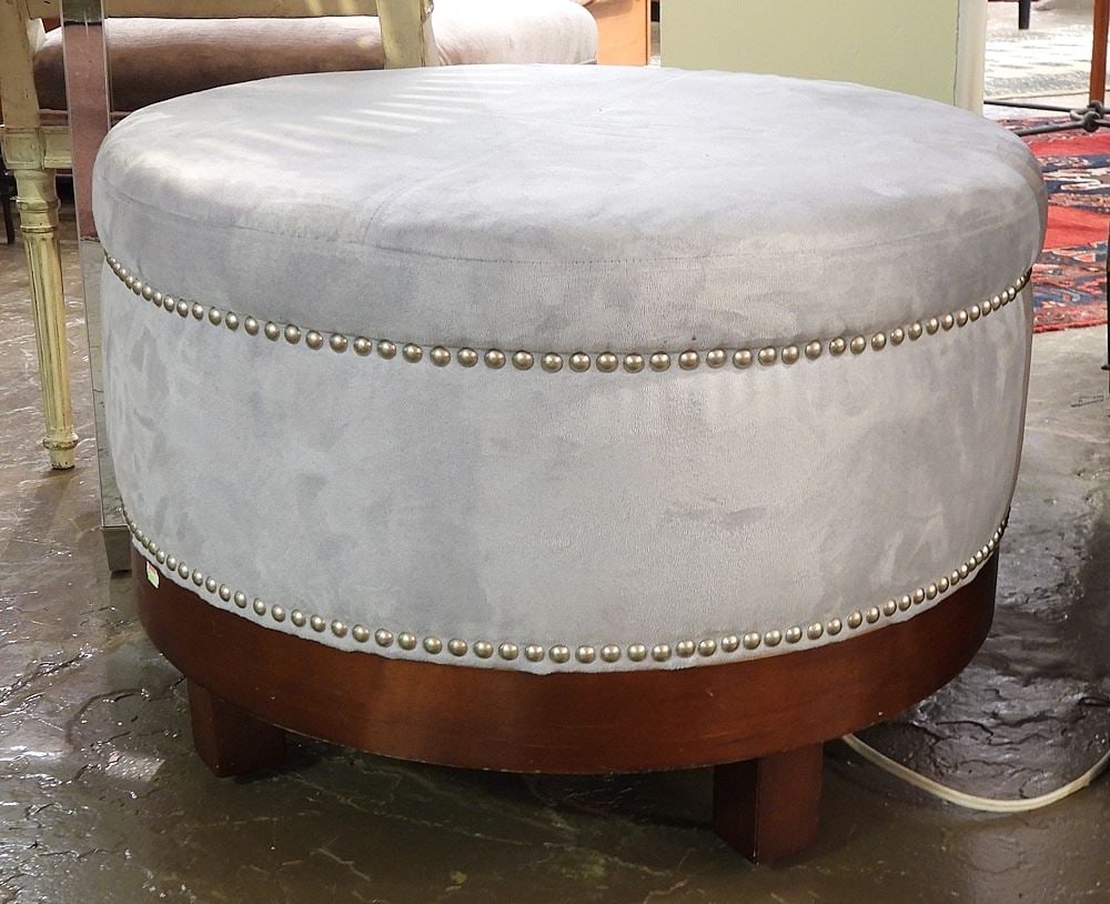 Blue Microsuede Ottoman, 17 x 24" Diameter (stained).: Blue Microsuede Ottoman, 17 x 24" Diameter (stained).