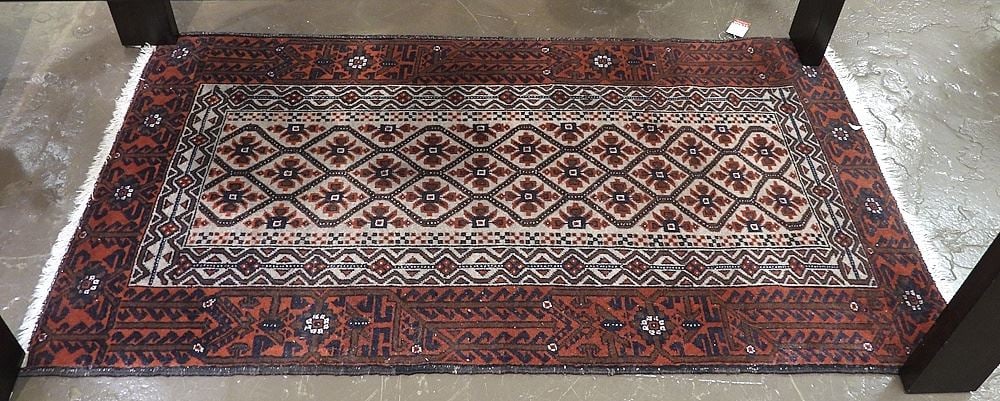 Hand Knotted Persian Carpet Approximately 2'11" x 4'5". (1 of 2)