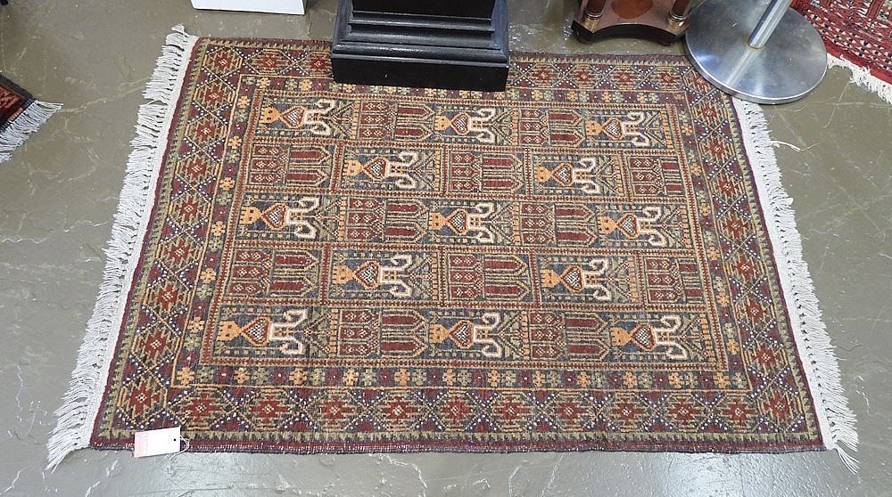 Hand Knotted Persian Carpet Approximately 2'10" x 5'1". (1 of 3)