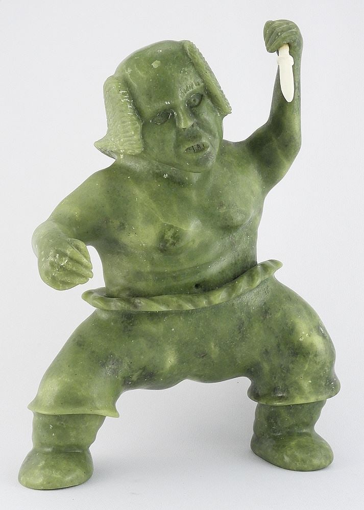Inuit Serpentine Carving Attributed to Quvianatuliak Takpaungai, 10 3/4" h "Figure Clutching...". (1 of 6)