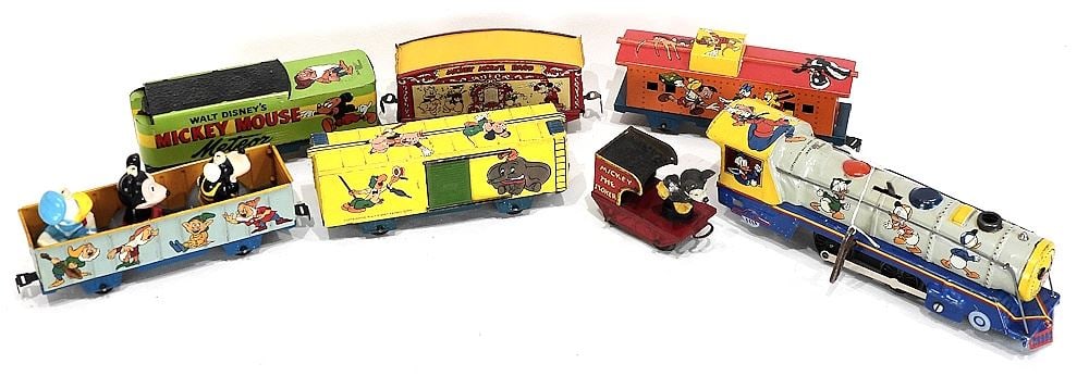 Walt Disney Productions "Mickey Mouse Meteor" Marx Wind-Up Tram Set (track + 5 pieces). (1 of 3)