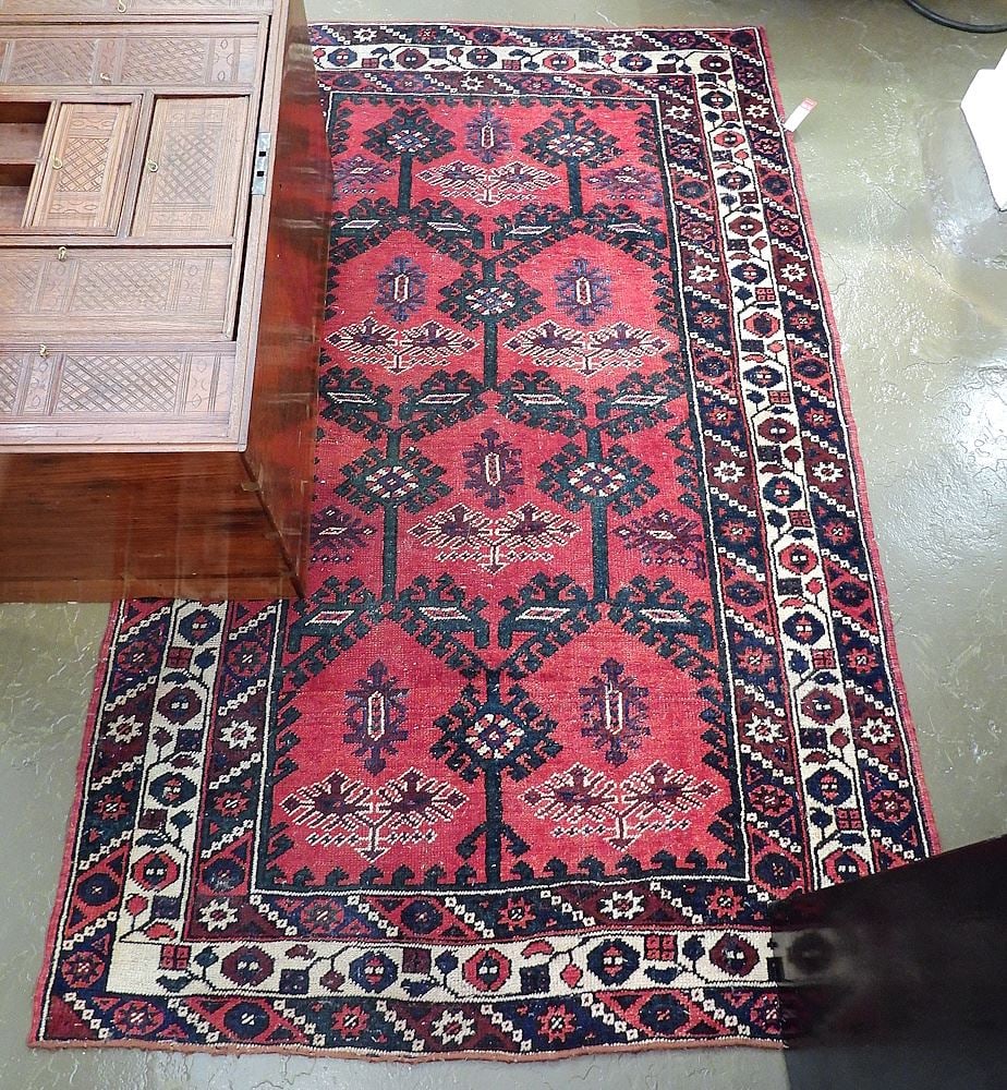 Hand Knotted Persian Carpet Approximately 4'1" x 6'8" (ends bound/holes noted). (1 of 2)