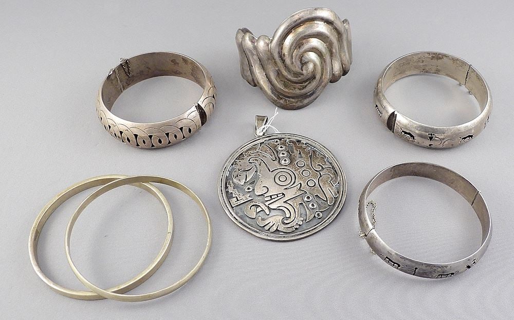 Collection of Six Mexican Sterling Silver Bracelets & a Pendant, 2 1/2 - 2 3/4"w, 194g. (1 of 2)
